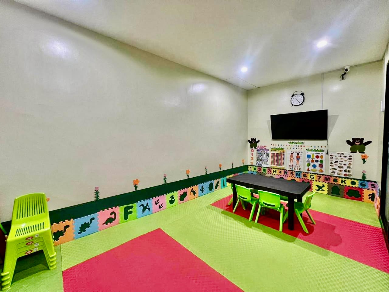 Spacious classroom with soft padded floors